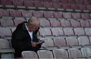 22 September 2017; A St Patrick's Athletic supporter studies the matchday programme ahead of the SSE Airtricity League Premier Division match between Bohemians and St Patrick's Athletic at Dalymount Park in Dublin. Photo by Eóin Noonan/Sportsfile