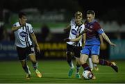 22 September 2017; Richie Purdy of Drogheda United in action against Jamie McGrath, left, and Steven Kinsella of Dundalk during the SSE Airtricity League Premier Division match between Dundalk and Drogheda United at Oriel Park in Louth. Photo by Seb Daly/Sportsfile