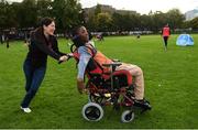 22 September 2017; Alec Akpan, age 16, from Castleknock, Co Dublin, takes part in the games with his physical education teacher Maria Aragon at the GAA Fun & Run Launch at Culture Night at Trinity College Cricket Ground in Dublin. GAA Fun & Run is a specially designed programme which focuses upon the integration and inclusion of people with disabilities in Gaelic games, while also giving participants the opportunity to take part in 60 minutes of moderate to vigorous activity. Photo by Cody Glenn/Sportsfile