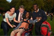 22 September 2017; Alec Akpan, age 16, from Castleknock, Co Dublin, pictured with his physical education teacher Maria Aragon, from left, Shane Curran, Director of Puntee Sports, and Akpan's father Etop Akpan, in attendance at the GAA Fun & Run Launch at Culture Night at Trinity College Cricket Ground in Dublin. GAA Fun & Run is a specially designed programme which focuses upon the integration and inclusion of people with disabilities in Gaelic games, while also giving participants the opportunity to take part in 60 minutes of moderate to vigorous activity. Photo by Cody Glenn/Sportsfile