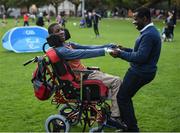 22 September 2017; Alec Akpan, age 16, from Castleknock, Co Dublin, and his father Etop work out together during the GAA Fun & Run Launch at Culture Night at Trinity College Cricket Ground in Dublin. GAA Fun & Run is a specially designed programme which focuses upon the integration and inclusion of people with disabilities in Gaelic games, while also giving participants the opportunity to take part in 60 minutes of moderate to vigorous activity. Photo by Cody Glenn/Sportsfile