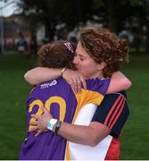 22 September 2017; Orla Reck, GAA Fun & Run volunteer, hugs her daughter Johanna Ward, age 10, after Johanna received her participation medal during the GAA Fun & Run Launch at Culture Night at Trinity College Cricket Ground in Dublin. GAA Fun & Run is a specially designed programme which focuses upon the integration and inclusion of people with disabilities in Gaelic games, while also giving participants the opportunity to take part in 60 minutes of moderate to vigorous activity. Photo by Cody Glenn/Sportsfile