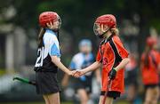 6 July 2012; Michelle Carey, Ballinteer St. Johns, right, shakes hands with Sarah Whyte, Good Counsel, after the game. Féile na nGael Átha Cliath 2012, Camogie, Division 1, Group A, Good Counsel, Dublin, v Ballinteer St. Johns, Dublin, Good Counsel GAA Club, Galtymore Road, Drimnagh, Dublin. Picture credit: Stephen McCarthy / SPORTSFILE