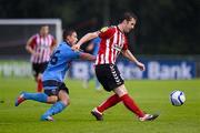 6 July 2012; Ryan McBride, Derry City, in action against Chris Lyons, UCD. Airtricity League Premier Division, UCD v Derry City, Belfield Bowl, UCD, Belfield, Dublin. Picture credit: Stephen McCarthy / SPORTSFILE