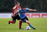 6 July 2012; Robbie Benson, UCD, in action against Simon Madden, Derry City. Airtricity League Premier Division, UCD v Derry City, Belfield Bowl, UCD, Belfield, Dublin. Picture credit: Stephen McCarthy / SPORTSFILE