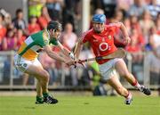 7 July 2012; Cian McCarthy, Cork, in action against Rory Hanniffy, Offaly. GAA Hurling All-Ireland Senior Championship Phase 2, Cork v Offaly, Pairc Ui Chaoimh, Cork. Picture credit: Stephen McCarthy / SPORTSFILE