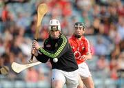 7 July 2012; Eoin Kelly, Offaly, in action against Jamie Coughlan, Cork. GAA Hurling All-Ireland Senior Championship Phase 2, Cork v Offaly, Pairc Ui Chaoimh, Cork. Picture credit: Stephen McCarthy / SPORTSFILE