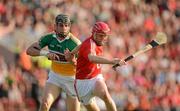 7 July 2012; Lorcan McLoughlin, Cork, in action against Conor Mahon, Offaly. GAA Hurling All-Ireland Senior Championship Phase 2, Cork v Offaly, Pairc Ui Chaoimh, Cork. Picture credit: Stephen McCarthy / SPORTSFILE