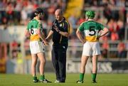 7 July 2012; Offaly manager Ollie Baker speaks to his players Rory Hanniffy, left, and Derek Morkan at half-time. GAA Hurling All-Ireland Senior Championship Phase 2, Cork v Offaly, Pairc Ui Chaoimh, Cork. Picture credit: Stephen McCarthy / SPORTSFILE