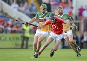 7 July 2012; Christopher Joyce, Cork, in action against Joe Bergin, Offaly. GAA Hurling All-Ireland Senior Championship Phase 2, Cork v Offaly, Pairc Ui Chaoimh, Cork. Picture credit: Stephen McCarthy / SPORTSFILE