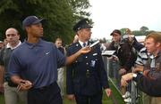 18 September 2002; Tiger Woods signs autographs as he makes his way off the 18th green during a practice round prior to the 2002 WGC-American Express Championship at Mount Juliet Golf Course in Thomastown, Kilkenny. Photo by Matt Browne/Sportsfile