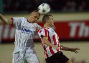 19 September 2002; David Kelly of Derry City in action against Tony McCarthy of Shelbourne during the eircom League Premier Division match between Derry City and Shelbourne at Brandywell Stadium in Derry. Photo by David Maher/Sportsfile