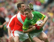 22 September 2002; Darragh O Se of Kerry in action against Barry O'Hagan of Armagh during the GAA Football All-Ireland Senior Championship Final match between match between Armagh and Kerry at Croke Park in Dublin. Photo by David Maher/Sportsfile