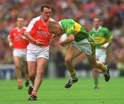 22 September 2002; Sean O'Sullivan of Kerry in action against Aidan O'Rourke of Armagh during the GAA Football All-Ireland Senior Championship Final match between Armagh and Kerry at Croke Park in Dublin. Photo by Brian Lawless/Sportsfile