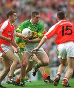 22 September 2002; Darragh O Se of Kerry in action against Diarmuid Marsden, 15, and Paul McGrane of Armagh during the GAA Football All-Ireland Senior Championship Final match between Armagh and Kerry at Croke Park in Dublin. Photo by Damien Eagers/Sportsfile