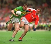 22 September 2002; Darragh O Se of Kerry in action against Justin McNulty of Armagh during the GAA Football All-Ireland Senior Championship Final match between Armagh and Kerry at Croke Park in Dublin. Photo by David Maher/Sportsfile