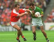 22 September 2002; John Sheehan of Kerry in action against Paddy McKeever of Armagh during the GAA Football All-Ireland Senior Championship Final match between Armagh and Kerry at Croke Park in Dublin. Photo by Brian Lawless/Sportsfile