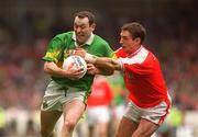 22 September 2002; Seamus Moynihan of Kerry in action against Kieran McGeeney of Armagh during the GAA Football All-Ireland Senior Championship Final match between Armagh and Kerry at Croke Park in Dublin. Photo by David Maher/Sportsfile