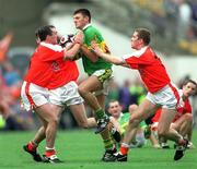 22 September 2002; Aodan MacGearailt of Kerry in action against Aidan O'Rourke, left, and Tony McEntee of Armagh during the GAA Football All-Ireland Senior Championship Final match between Armagh and Kerry at Croke Park in Dublin. Photo by Damien Eagers/Sportsfile