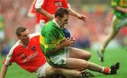22 September 2002; John Sheehan of Kerry in action against John Toal of Armagh during the GAA Football All-Ireland Senior Championship Final match between Armagh and Kerry at Croke Park in Dublin. Photo by Damien Eagers/Sportsfile