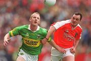 22 September 2002; Liam Hassett of Kerry in action against Aidan O'Rourke of Armagh during the GAA Football All-Ireland Senior Championship Final match between Armagh and Kerry at Croke Park in Dublin. Photo by Brendan Moran/Sportsfile