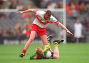 22 September 2002; Caoimhin King of Meath in action against Barry McGoldrick of Derry during the GAA Football All-Ireland Minor Championship Final match between Derry and Meath at Croke Park in Dublin. Photo by Ray McManus/Sportsfile