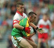 22 September 2002; Ger McCullagh of Meath in action against Ciaran McCallon of Derry during the GAA Football All-Ireland Minor Championship Final match between Derry and Meath at Croke Park in Dublin. Photo by Brendan Moran/Sportsfile