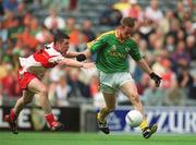 22 September 2002; Joe Melia of Meath in action against Paul Young of Derry during the GAA Football All-Ireland Minor Championship Final match between Derry and Meath at Croke Park in Dublin. Photo by Brendan Moran/Sportsfile
