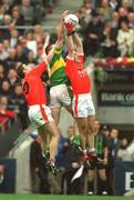 22 September 2002; Darragh O Se of Kerry in action against Paul McGrane, left, and Barry O'Hagan of Armagh during the GAA Football All-Ireland Senior Championship Final match between Armagh and Kerry at Croke Park in Dublin. Photo by Brendan Moran/Sportsfile