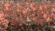 22 September 2002; Armagh players lift the Sam Maguire Cup to the cheers of Armagh supporters following the GAA All-Ireland Senior Football Championship Final match between Armagh and Kerry at Croke Park in Dublin. Photo by Brendan Moran/Sportsfile