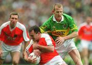 22 September 2002; Aidan O'Rourke of Armagh in action against Liam Hassett of Kerry during the GAA Football All-Ireland Senior Championship Final match between Armagh and Kerry at Croke Park in Dublin. Photo by Brendan Moran/Sportsfile
