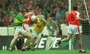 22 September 2002; Diarmuid Marsden of Armagh is tackled by Kerry goalkeeper Declan O'Keeffe and Marc O Se during the GAA Football All-Ireland Senior Championship Final match between Armagh and Kerry at Croke Park in Dublin. Photo by Ray McManus/Sportsfile