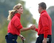 25 September 2002; Emma Cabrera of Europe is congratulated by playing partner Benjamin Regent after they won 6&5 on the 13th green during day two of the Junior Ryder Cup Matches at The K Club in Straffan, Kildare. Photo by Matt Browne/Sportsfile