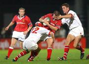 27 September 2002; Marcus Horan of Munster is tackled by Jonathan Bell, 12, and Tony McWhirter of Ulster during the Celtic League Pool A match between Ulster and Munster at Ravenhill in Belfast. Photo by Matt Browne/Sportsfile
