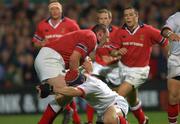 27 September 2002; Rob Laffan of Munster is tackled by Neil Doak of Ulster during the Celtic League Pool A match between Ulster and Munster at Ravenhill in Belfast. Photo by Matt Browne/Sportsfile