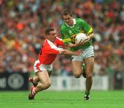 22 September 2002; Eoin Brosnan of Kerry in action against Diarmuid Marsden of Armagh during the GAA Football All-Ireland Senior Championship Final match between Armagh and Kerry at Croke Park in Dublin. Photo by Brian Lawless/Sportsfile