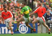22 September 2002; Eoin Brosnan of Kerry in action against Enda McNulty, left, and Francis Bellew of Armagh during the GAA Football All-Ireland Senior Championship Final match between Armagh and Kerry at Croke Park in Dublin. Photo by Brian Lawless/Sportsfile