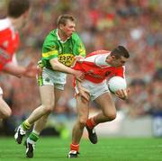 22 September 2002; Oisin McConville on Armagh in action against Tomas O Se of Kerry during the GAA Football All-Ireland Senior Championship Final match between Armagh and Kerry at Croke Park in Dublin. Photo by Ray McManus/Sportsfile