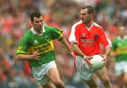 22 September 2002; Steven McDonnell of Armagh in action against Michael McCarthy of Kerry during the GAA Football All-Ireland Senior Championship Final match between Armagh and Kerry at Croke Park in Dublin. Photo by Brian Lawless/Sportsfile