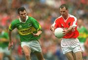 22 September 2002; Steven McDonnell of Armagh in action against Michael McCarthy of Kerry during the GAA Football All-Ireland Senior Championship Final match between Armagh and Kerry at Croke Park in Dublin. Photo by Brian Lawless/Sportsfile