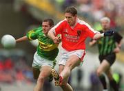 22 September 2002; Kieran McGeeney Armagh in action against Eoin Brosnan of Kerry during the GAA Football All-Ireland Senior Championship Final match between Armagh and Kerry at Croke Park in Dublin. Photo by Damien Eagers/Sportsfile