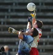 7 September 2002; Bryan Cullen of Dublin in action against Paul Rouse of Tyrone during the All-Ireland U21 Football Semi-Final match between Dublin and Tyrone at Breffni Park in Cavan. Photo by Damien Eagers/Sportsfile