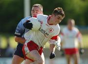 7 September 2002; Stephen McNally of Tyrone in action against Declan Lally of Dublin during the All-Ireland U21 Football Semi-Final match between Dublin and Tyrone at Breffni Park in Cavan. Photo by Damien Eagers/Sportsfile