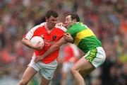 22 September 2002; Ronan Clarke of Armagh in action against Seamus Moynihan of Kerry during the GAA Football All-Ireland Senior Championship Final match between Armagh and Kerry at Croke Park in Dublin. Photo by Ray McManus/Sportsfile