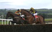 29 September 2002; See More Perks, with Jamie Codd up, left, jumps the last alongside Prince Wot A Mess, with Alan Cash up, on their way to winning the Ingoldsby Handicap Steeplechase at Punchestown Racecourse in Naas, Kildare. Photo by Matt Browne/Sportsfile