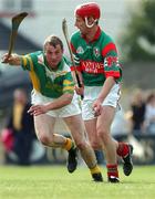 29 September 2002; Paul Molloy of Birr in action against Henry Kilmartin of Kilcormac /Killoughey during the Offaly County Senior Hurling Final match between Birr and Kilcormac / Kelloughey at St. Brendan's Park in Birr, Offaly. Photo by David Maher/Sportsfile