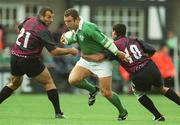 28 September 2002; Kevin Maggs of Ireland in action against Paul Jimsheladze and Vassil Katsadze of Georgia during the Rugby World Cup 2003 Qualifier match between Ireland and Georgia at Lansdowne Road in Dublin. Photo by Brendan Moran/Sportsfile