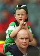 28 September 2002; A young Ireland rugby supporter watches the game from his father's shoulders during the Rugby World Cup 2003 Qualifier match between Ireland and Georgia at Lansdowne Road in Dublin. Photo by Brendan Moran/Sportsfile