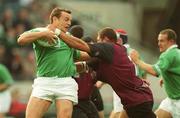28 September 2002; Rob Henderson of Ireland is tackled by George Chkhaidze of Georgia during the Rugby World Cup 2003 Qualifier match between Ireland and Georgia at Lansdowne Road in Dublin. Photo by Brendan Moran/Sportsfile