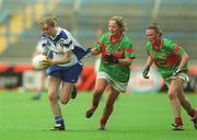 29 September 2002; Edel Byrne of Monaghan is tackled by Nuala O'Shea of Mayo during the All-Ireland Senior Ladies Football Championship Final match between Monaghan and Mayo at Croke Park in Dublin. Photo by Ray McManus/Sportsfile